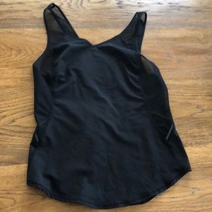 Lululemon tank cross back. Open netting sides and straps.